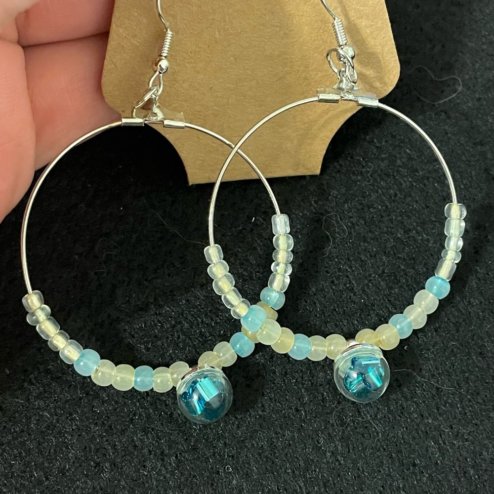 Earrings, luminescent glass beads